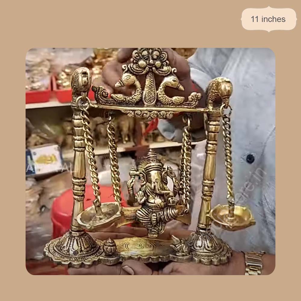  Ganesha Idol on Brass Swing with Diyas (11 Inchs)